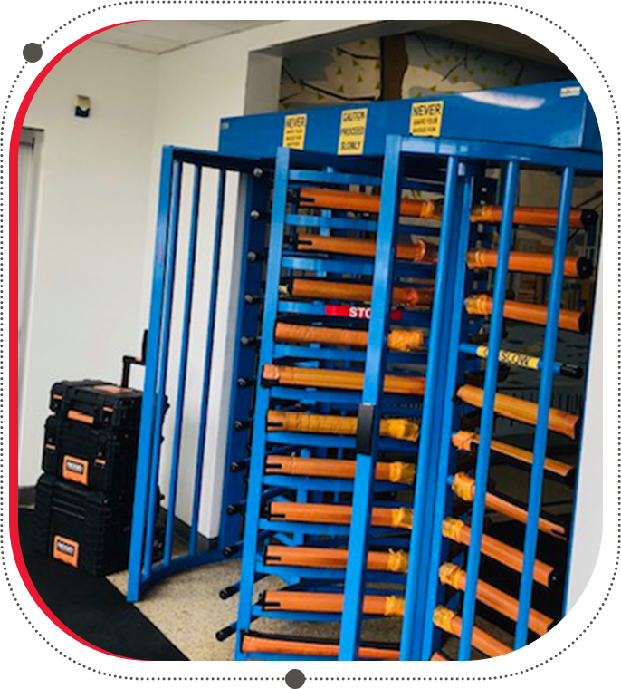 A large blue metal rack with many orange shelves.