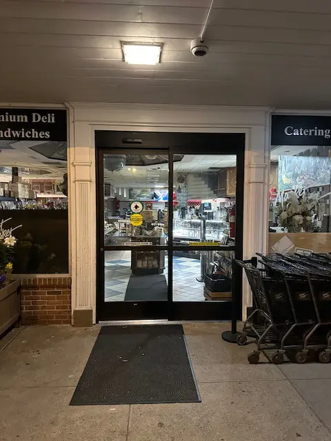 A store front with several carts in it.